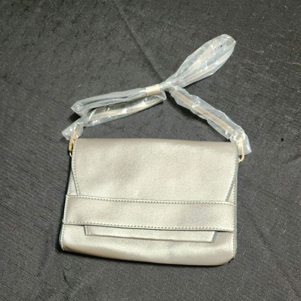 Summer & Rose Silver Celine Crossbody Bag. Approx. 9x7in.
